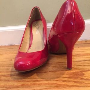 red patent pumps, heels size 8.5